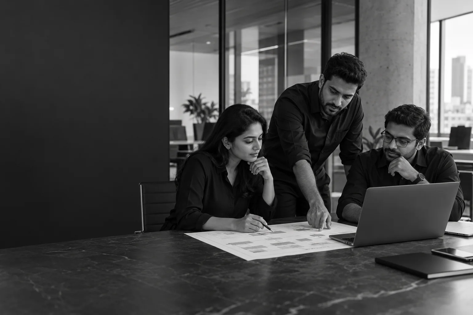 Illustrative image of a product team reviewing a workflow together